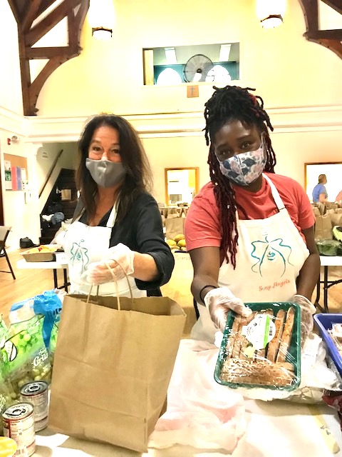 Dana Reynolds (left)  and Valerie Mondesir (right) prepare food for those in need at Nyack's Soup Angels.