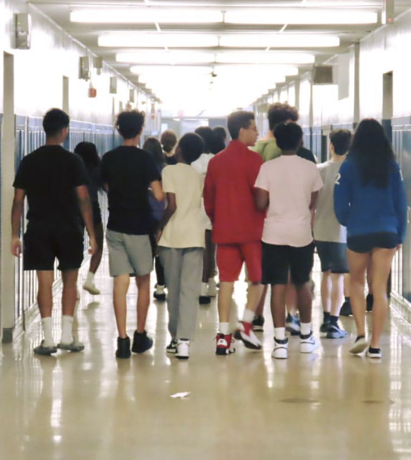 A group of freshmen make their way through the hallways, stepping into a new world of opportunities!