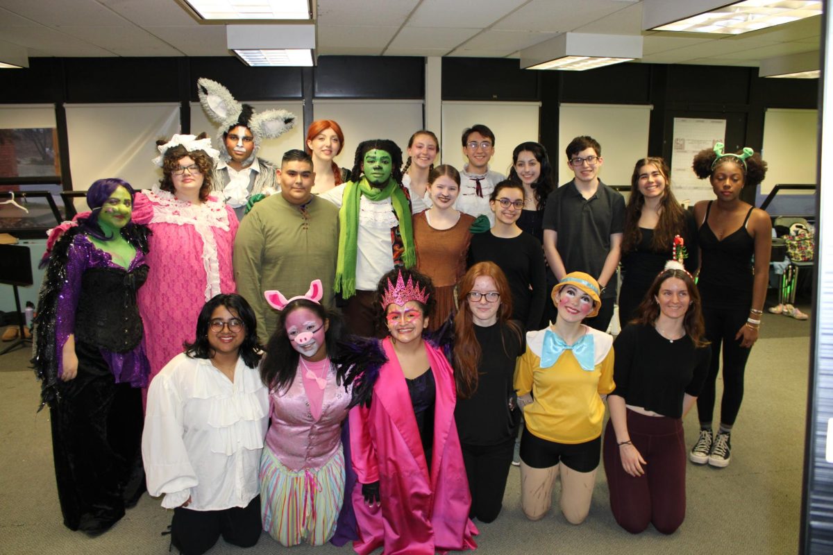 Nanuet's Drama Club seniors pose for a picture in their Shrek costumes. 