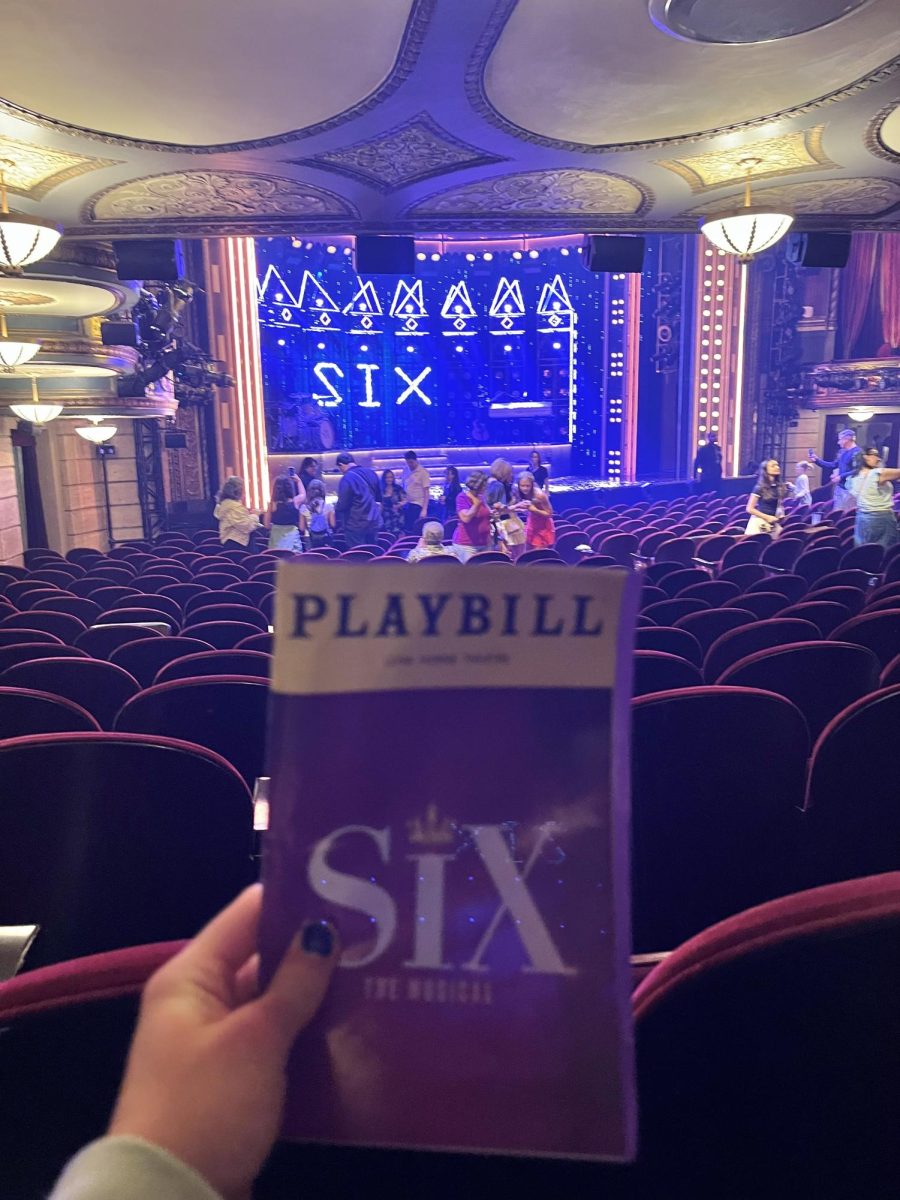 Photo taken of the Playbill and closing stage for the musical 'Six' at The Lena Horne Theatre.